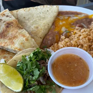 Quesadilla pollo  Carne asada street taco with fresh onions and cilantro / lime. Green sauce is perfect