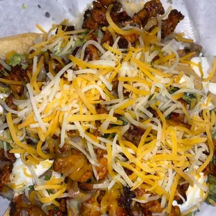 Super nachos with pastor.