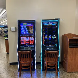 two arcade machines in a store
