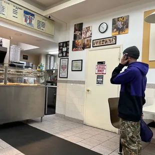 a man standing in the kitchen