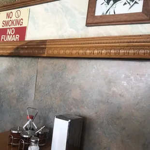 Nasty sign in restaurant everyone know there's no more smoking allowed in restaurant