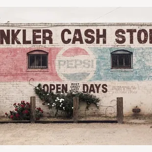 an old sign on a building