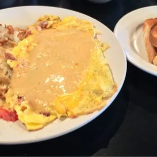 Turkey club omelette, hash brown and toast