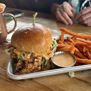 Spicy chicken sandwich with sweet potato fries