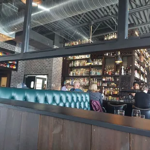 people sitting at a bar