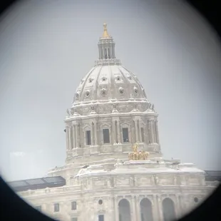 The view of the Capitol from the binoculars.