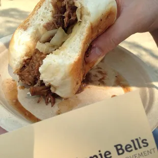 inside of the beef &amp; short rib sandwich with stewed onions.