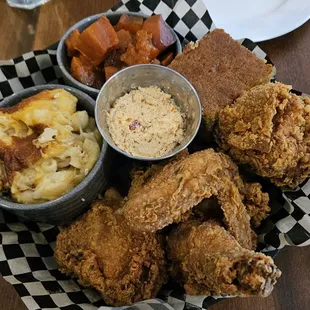 4 piece meal with cornbread, Mac and cheese, candied yams, and hot honey butter