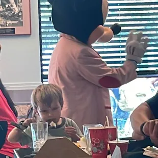 Mickey Going Table to Table