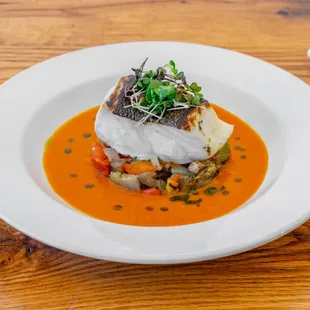 Cabillaud au Four - Baked cod, ratatouille, tomato coulis, fresh herbs oil