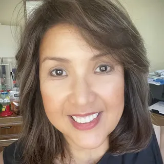 Gina M.