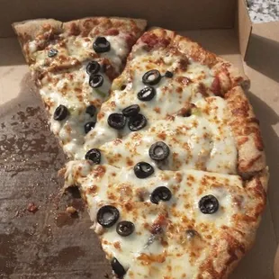 Near perfect pizza half gone.