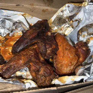 Pizza was delicious but I do think the wings got a bit burnt