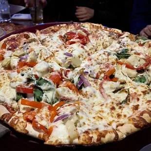 a whole pizza on a pan