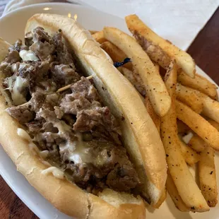 Philly Cheesesteak Sandwich and Seasoned Fries. Delicious!