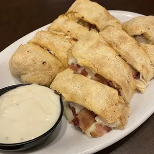 Garlic cheese bacon rolls with Alfredo dipping sauce