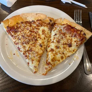 two slices of pizza on a plate