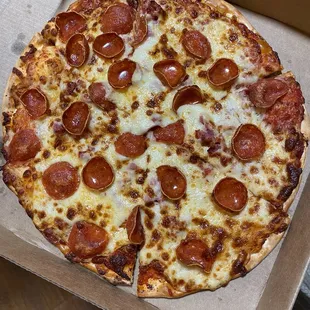 Pepperoni pizza on thin crust