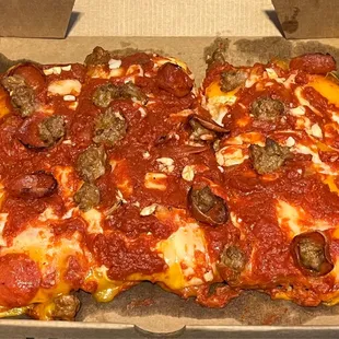 New Detroit pizza (gluten free) looks like a hot mess but it was delicious.