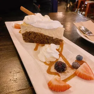 Carrot cake cheesecake with caramel sauce