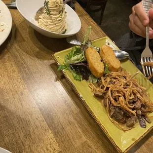 BRAISED TENDERLOIN TIPS* - 19 Wild Mushrooms, House-made Zip Sauce, Fried Onions, Crostinis  SMASHED POTATOES 8