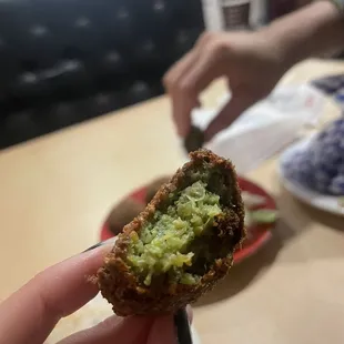 Inside of falafel. Personally, I would&apos;ve preferred more flavor or salt.