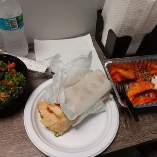 Chicken Shawarma, Tabbule, and Lebanese potatoes with garlic sauce.