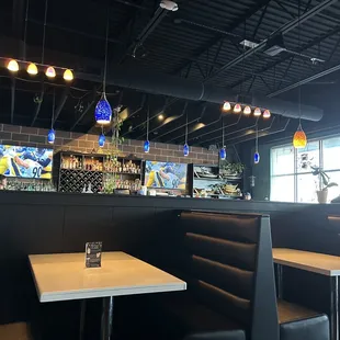 Dining area with bar area behind