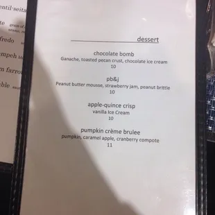 a menu for desserts on a table