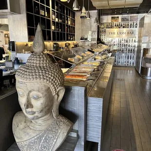 a buddha statue in a restaurant