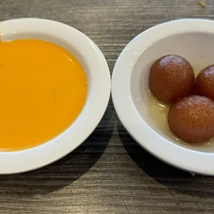 Mango like pudding with fruits and gulab jaman