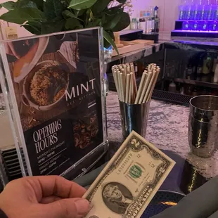 2 dollars bill   (Extra tip)