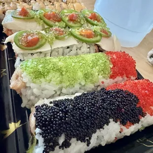 Python Roll, (middle) Spicy Yellowtail, (further) Blaze Roll