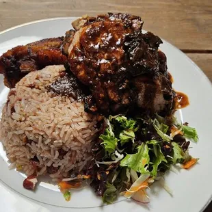 Smoked Jamaican Jerk Chicken with Plantain and Rice & Beans.  Delicious!