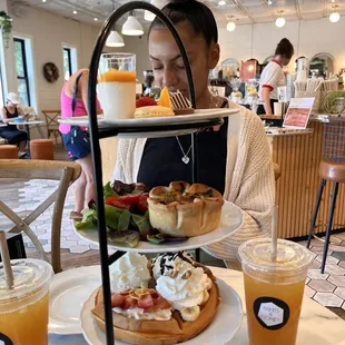 Afternoon Tea Tower, with waffles, quiche and treats.