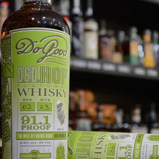 a bottle and a roll of beer