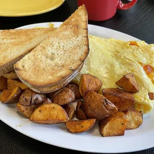 Custom omelet with cheddar, tomato and onion