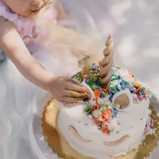 Unicorn smash cake for Stella's first birthday
