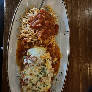Awesome veal steak , spaghetti, and marinara sauce.