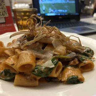 Russia - grilled chicken, spicy vodka sauce with added mushrooms.