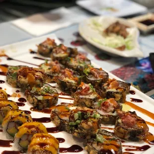 a plate of sushi on a table