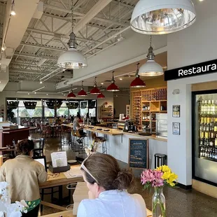 Host desk and dining room in the back