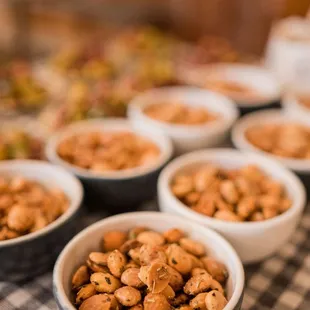 bowls of nuts on a table