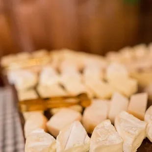 a tray of cheeses