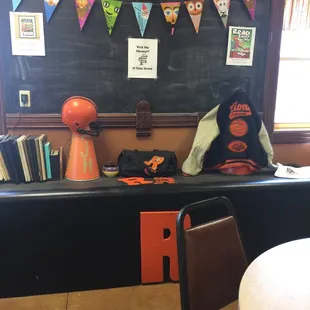 a blackboard with a chalkboard and a clock