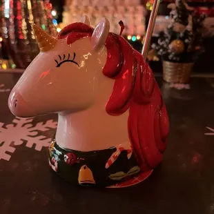 Holiday-themed drinks in festive holiday cups! Cups are available for purchase. Unicorn drink!