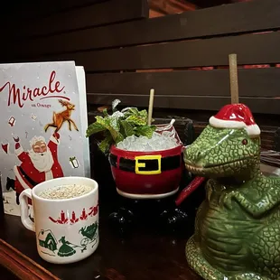 a frog and a mug of coffee