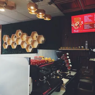 Such attention to detail with the honey combs on the wall and the lights. So cute