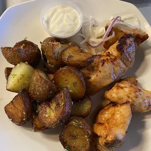 Russian potatoes with chicken kebab.