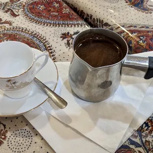 Turkish Coffee with enough to fill the cup almost 3 times